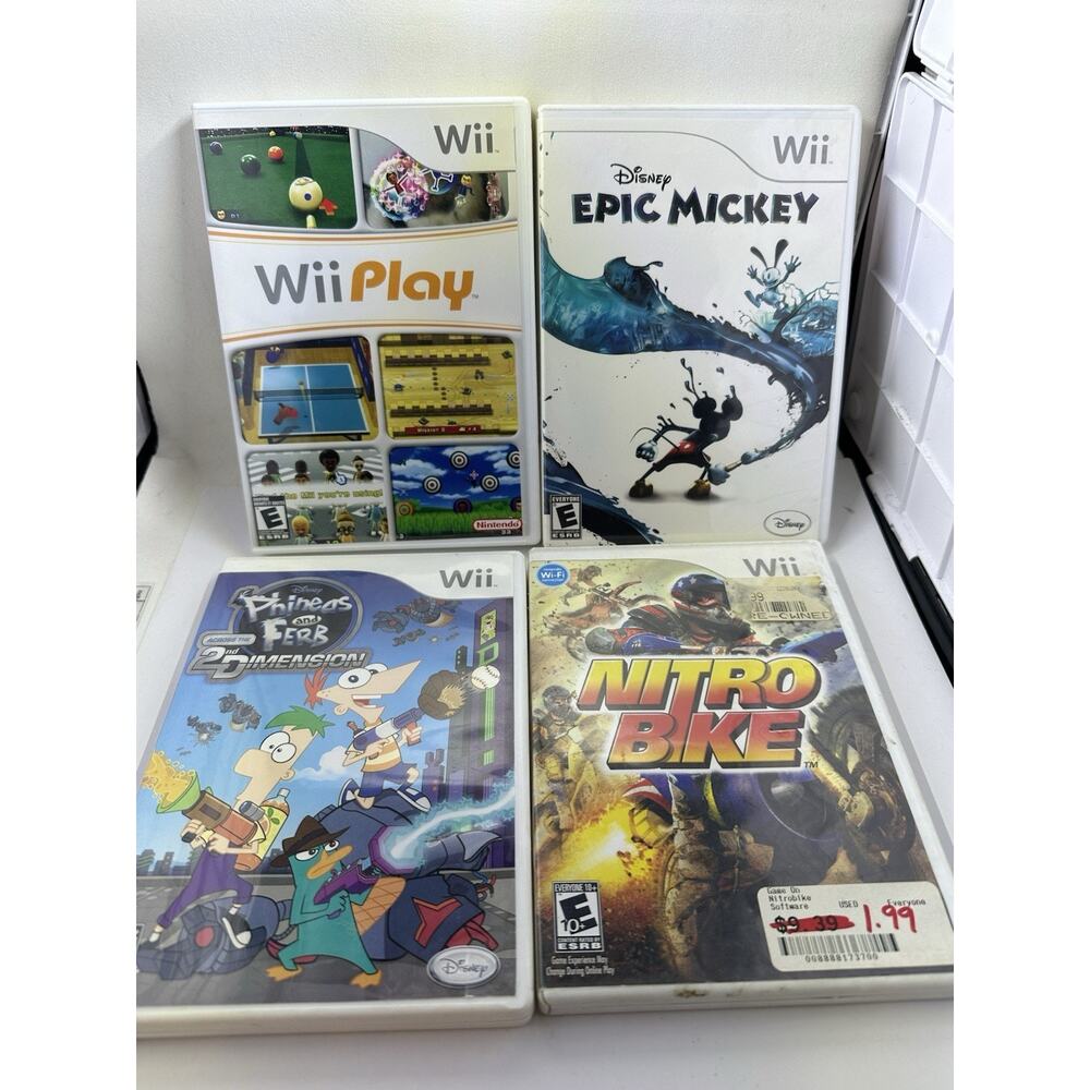 Lot 4 Nintendo Wii Games Ferb Nitro Bike Phineas Epic Mickey Play Bundle